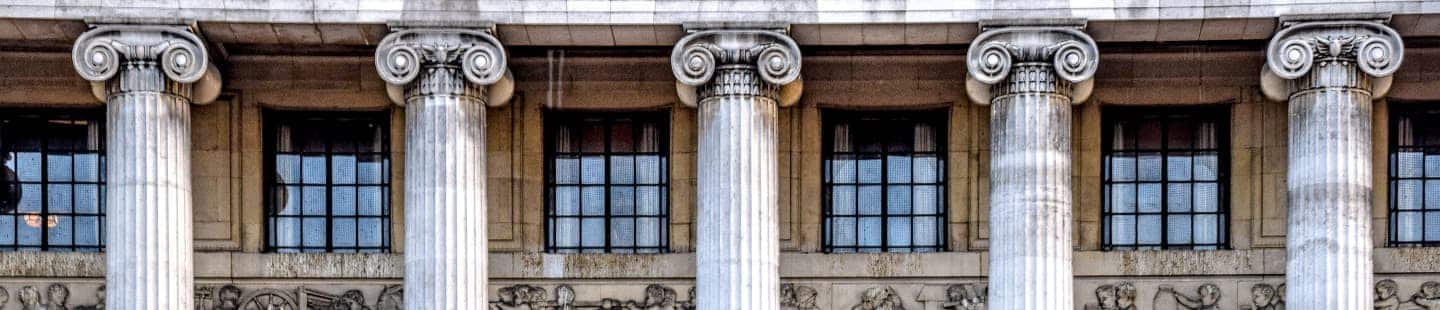 close up of a buildings roman columns